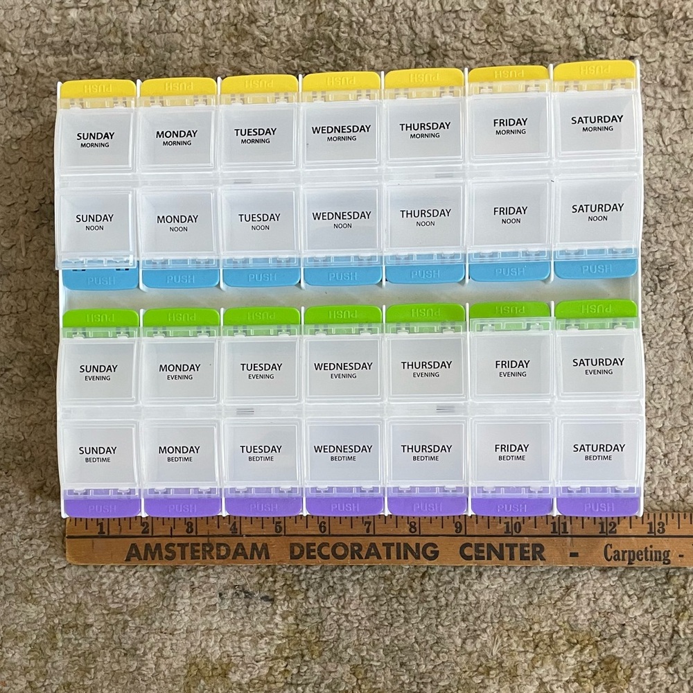Month Pill organizer -Weekly 
Clear with Yellow, Blue, Green, Purple Tabs.